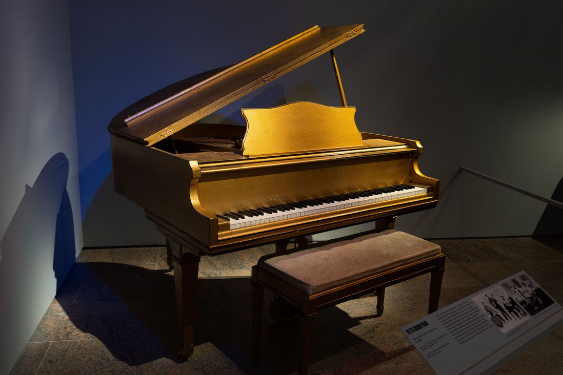 Jerry Lee Lewis' Gold Baby Grand Piano, which was Lewis’ home piano from 1957 until 2017.